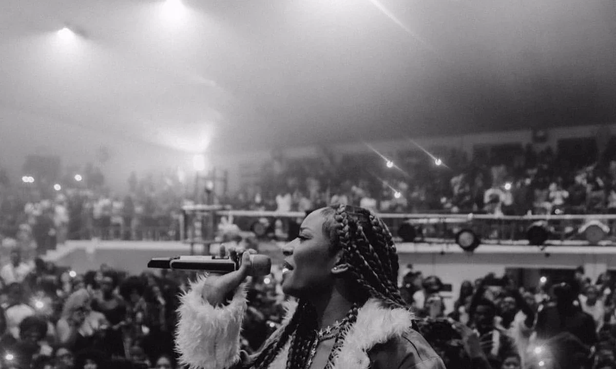 Ayra Starr performing to a crowd in Nigeria